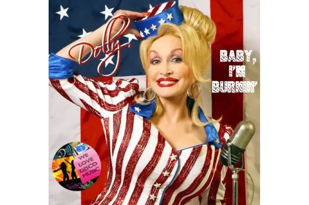 Dolly parton is wearing a patriotic outfit and holding her hands up.