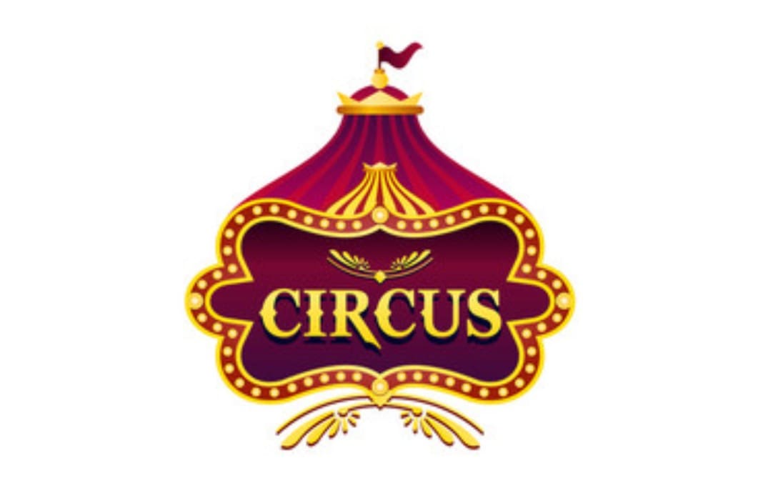 A circus sign with the word " circus " written underneath it.